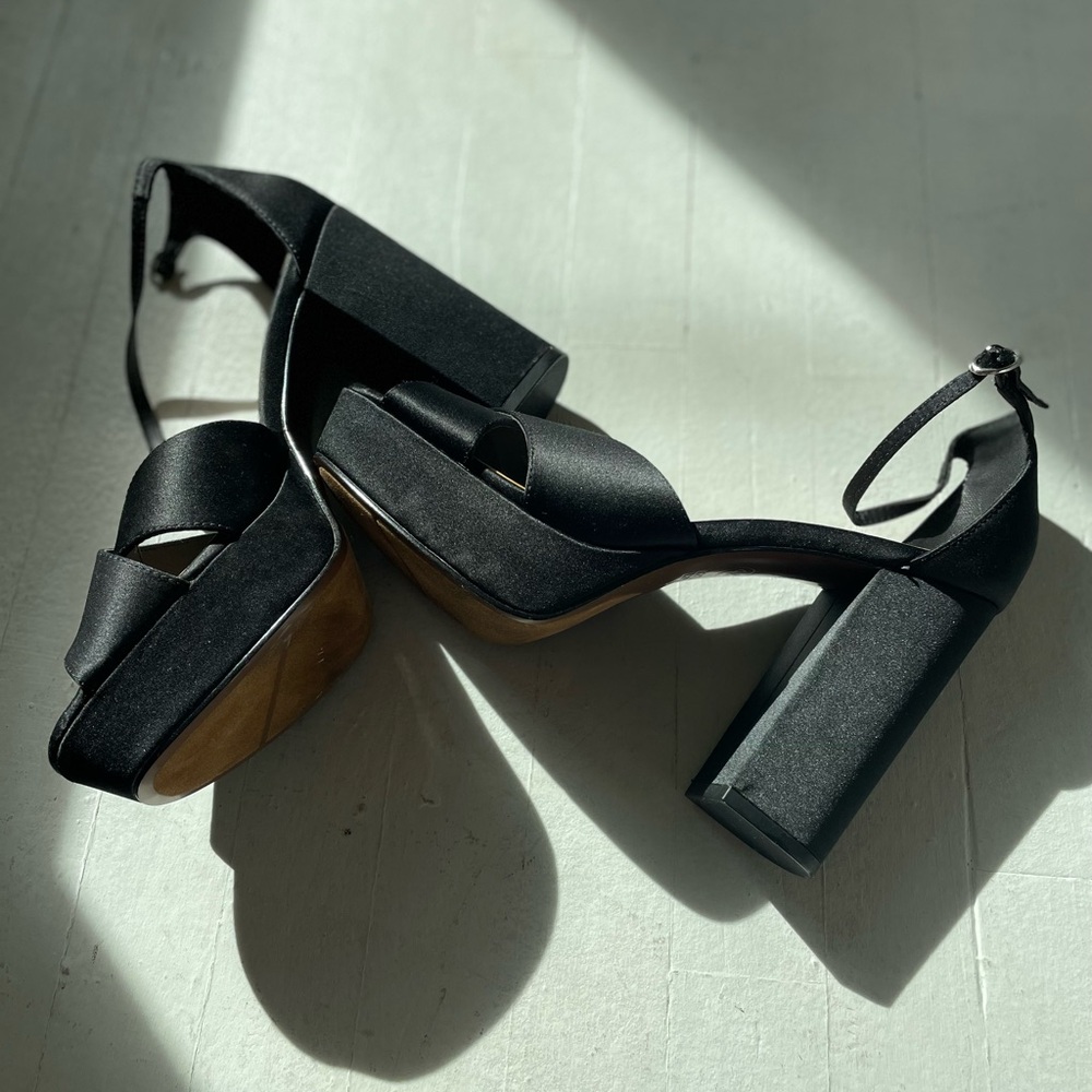 Dress up your favorite outfit. 
Sexy Who What Wear Black Platform Women's Heels